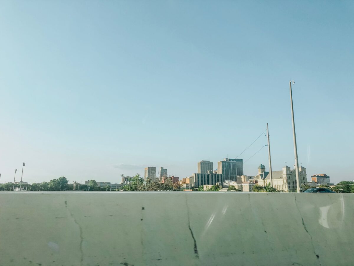 Scenic view of downtown Dayton skyline under a clear blue sky, ideal for urban landscapes.
